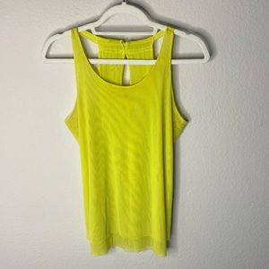 Oiselle neon tank top with cutout racerback detail. Double layered mesh.